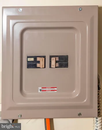 a living room with a rug and a rug