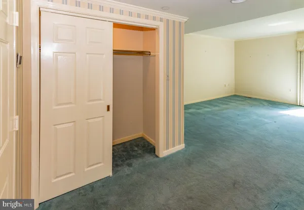 a kitchen with a sink stove and refrigerator