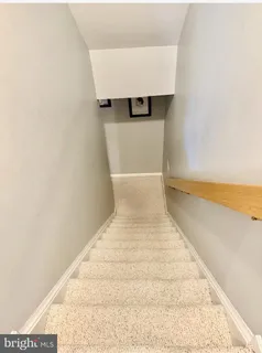 a view of hallway with stairs