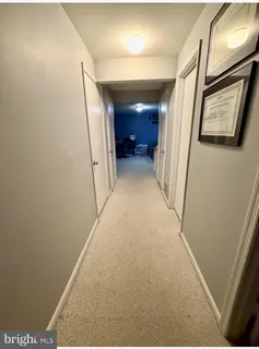 a view of workspace with furniture and window