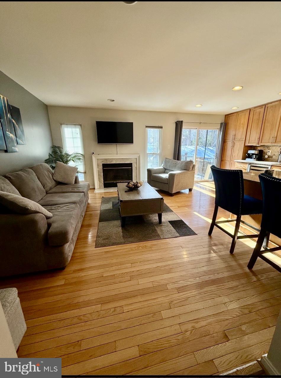 1502 Casino Circle Silver Spring, MD 20906 - Photo 5 of 21 a living room with furniture and a flat screen tv
