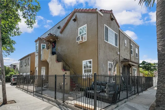 a front view of a building with glass windows