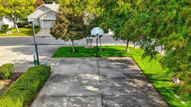 an aerial view of a house with a lake view
