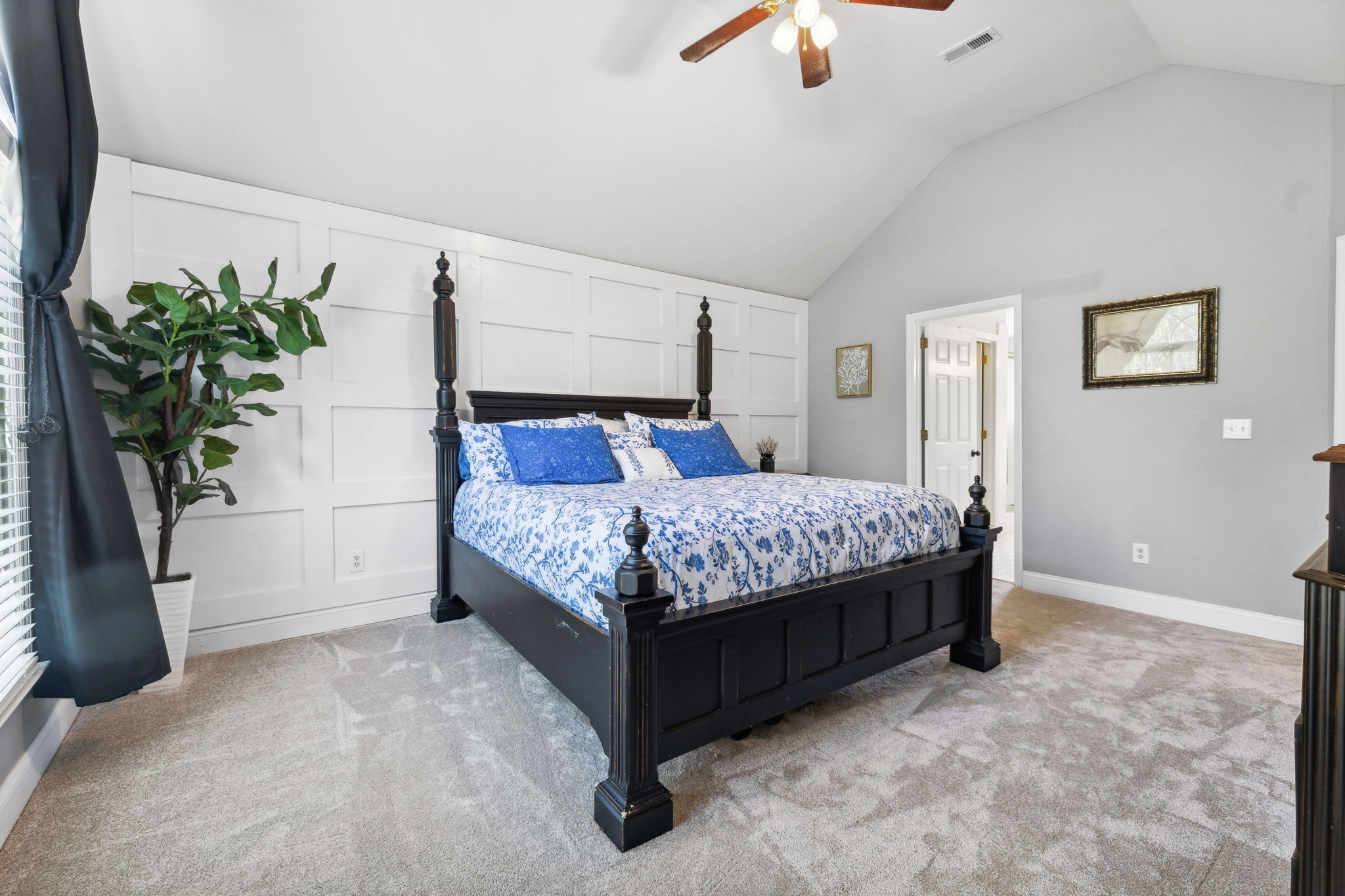 412 Martingale Drive Franklin, TN 37067 - Photo 22 of 56 a bedroom with a large bed and a potted plant