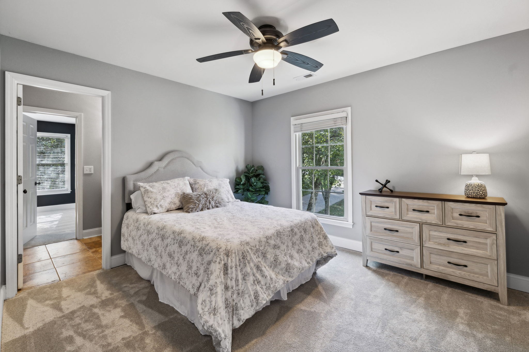 412 Martingale Drive Franklin, TN 37067 - Photo 34 of 56 a bedroom with a bed and a ceiling fan