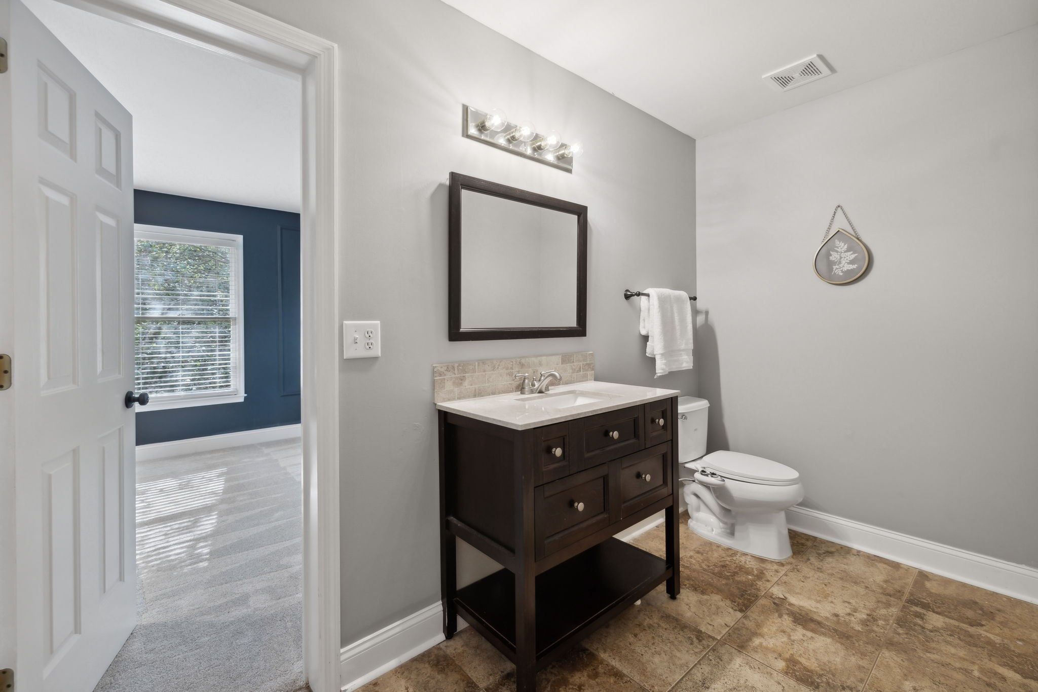 412 Martingale Drive Franklin, TN 37067 - Photo 35 of 56 a bathroom with a toilet sink and mirror