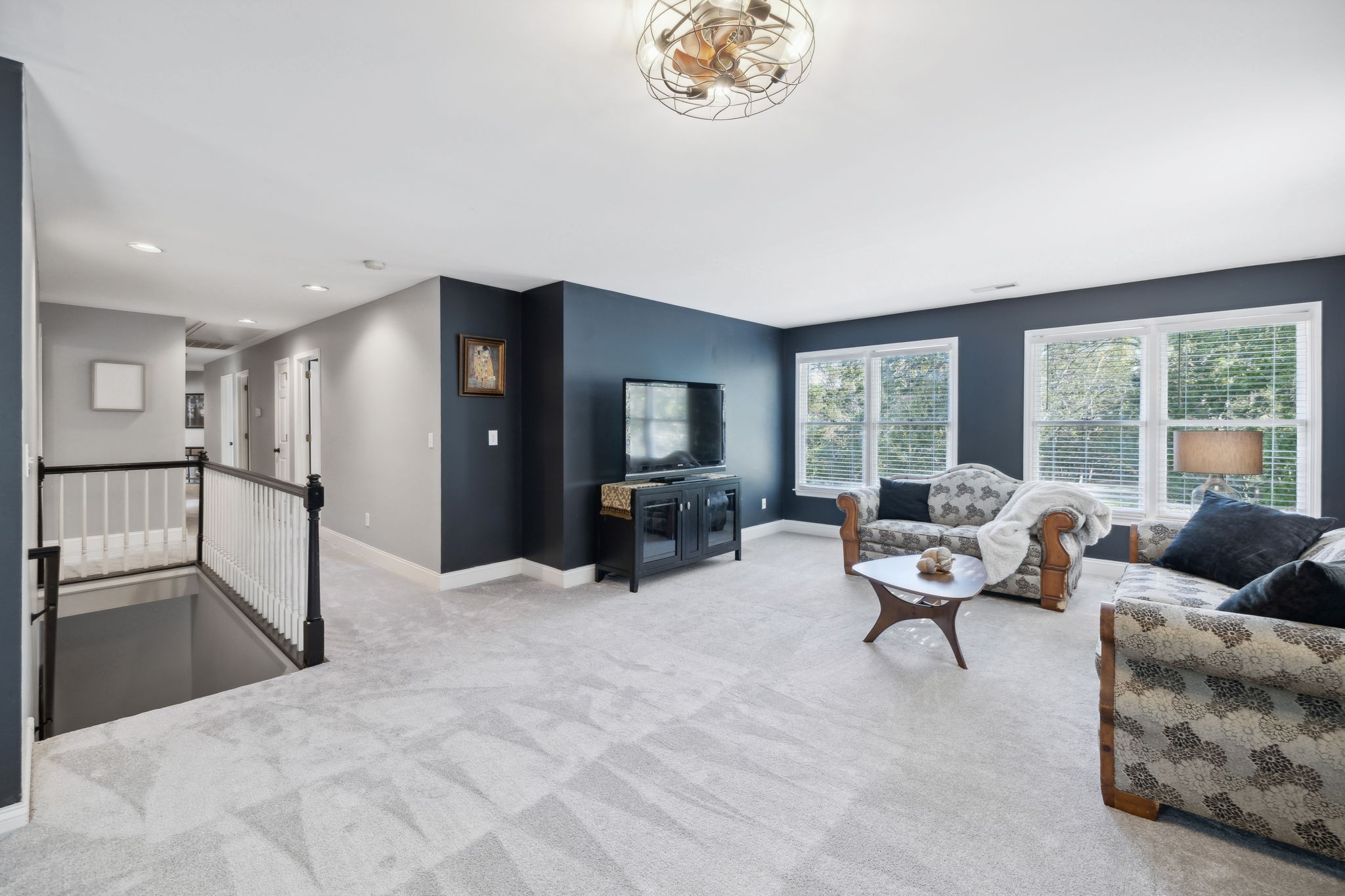 412 Martingale Drive Franklin, TN 37067 - Photo 36 of 56 a living room with furniture and a flat screen tv