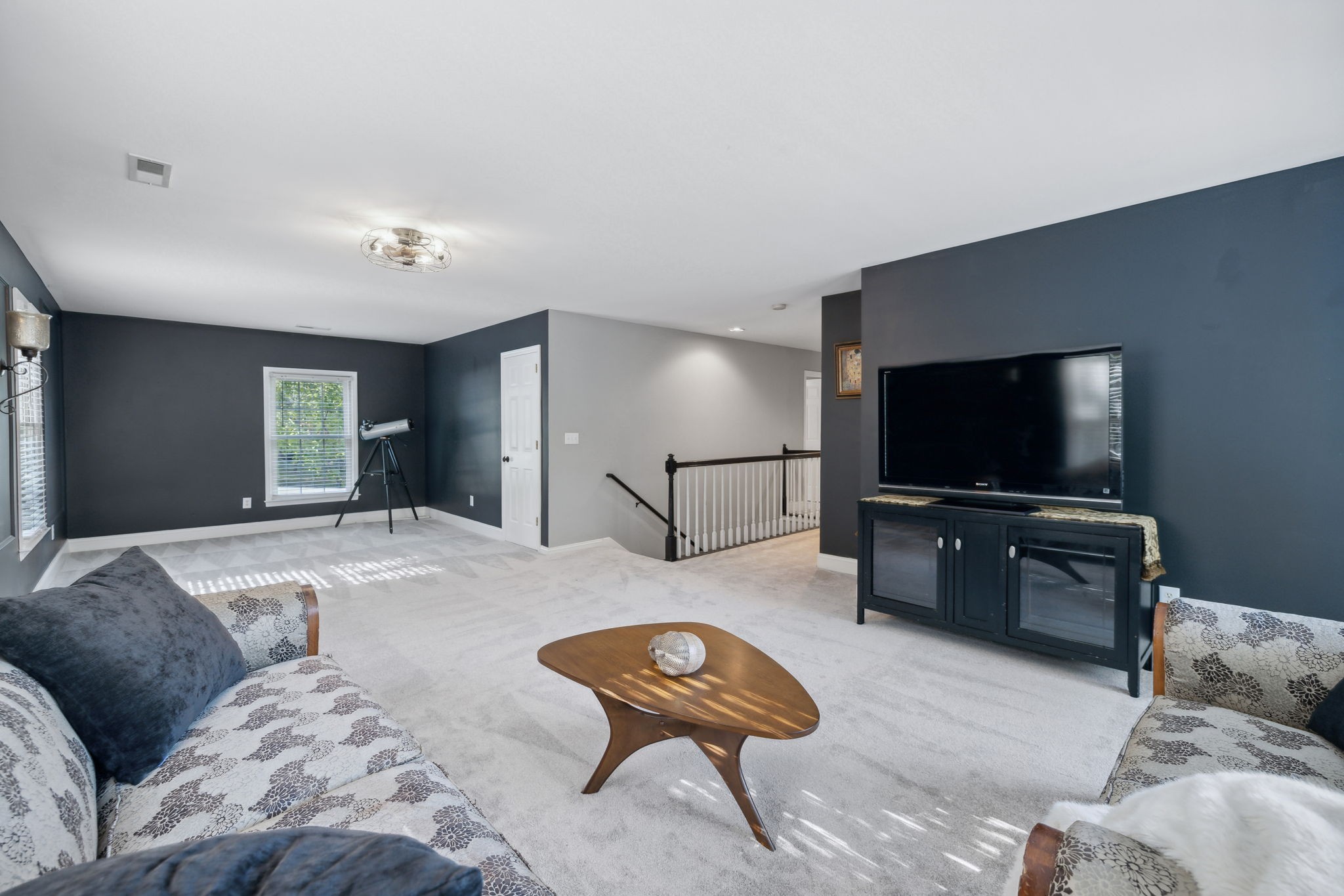 412 Martingale Drive Franklin, TN 37067 - Photo 37 of 56 a living room with furniture and a flat screen tv