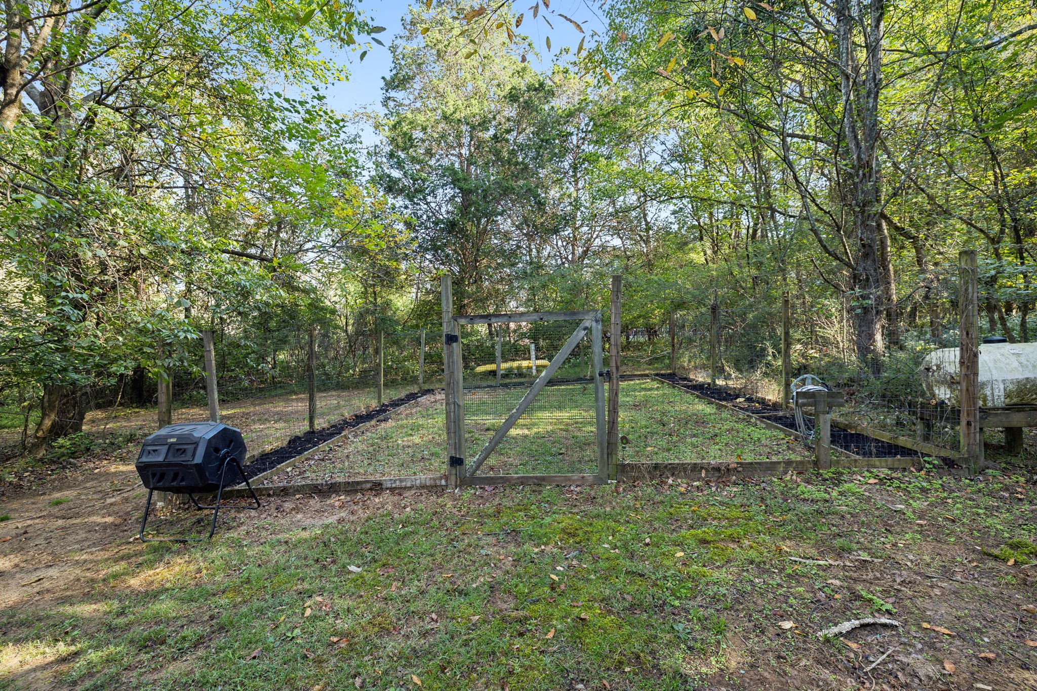 412 Martingale Drive Franklin, TN 37067 - Photo 48 of 56 a backyard of a house with lots of green space