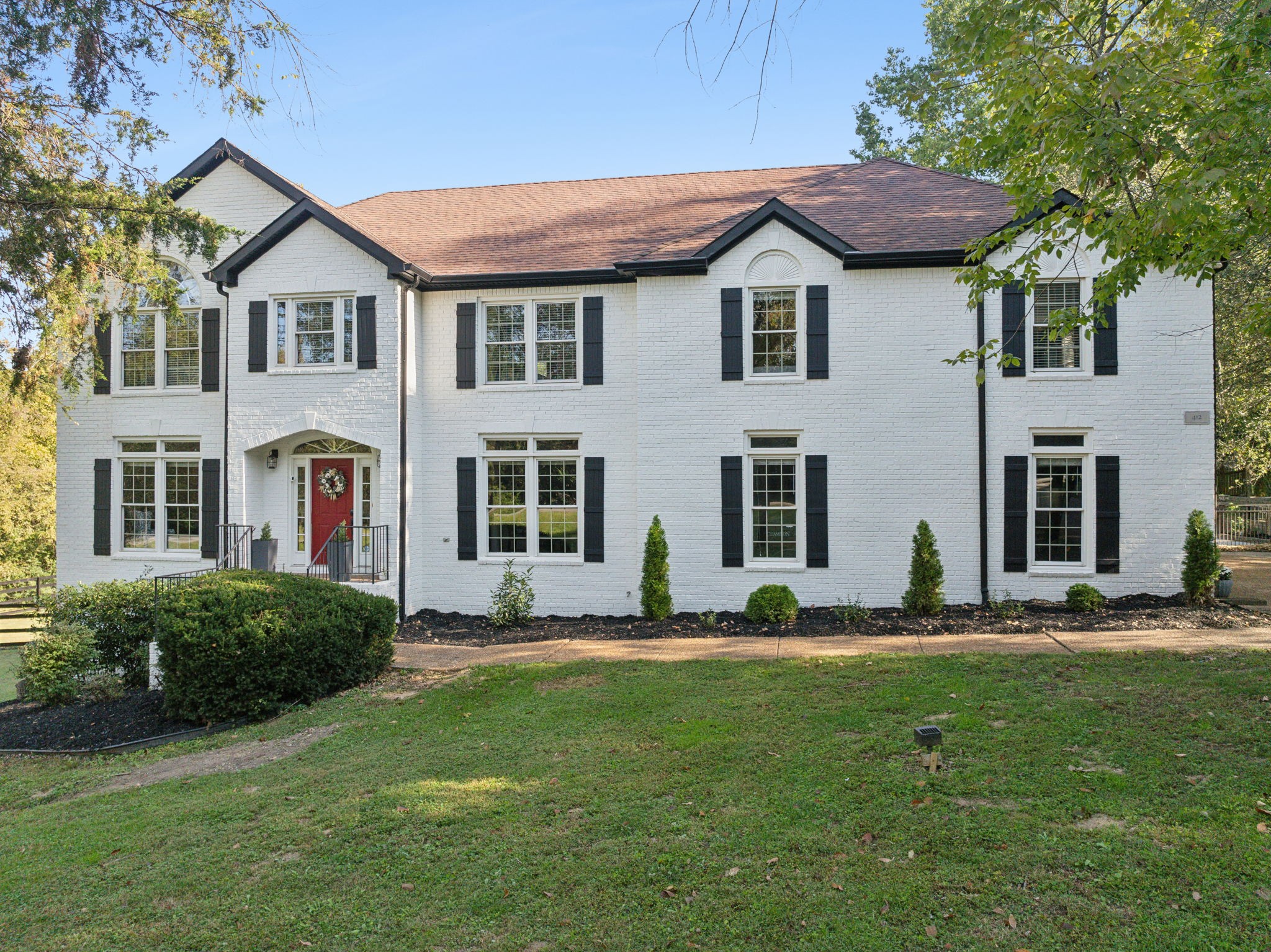 412 Martingale Drive Franklin, TN 37067 - Photo 49 of 56 a front view of a house with a yard