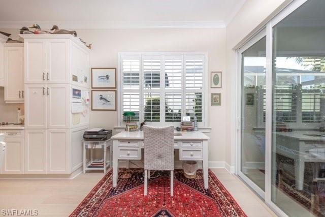 5717 Anegada Drive Naples, FL 34113 - Photo 20 of 37 a dining room with furniture and window
