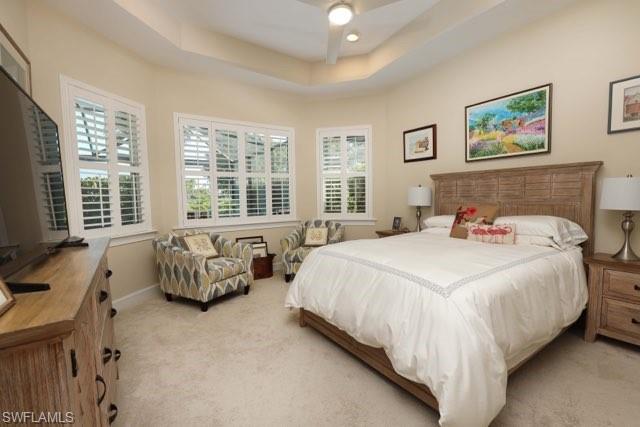 5717 Anegada Drive Naples, FL 34113 - Photo 2 of 37 a bedroom with bed and a large window
