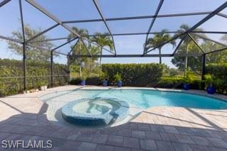 5717 Anegada Drive Naples, FL 34113 - Photo 26 of 37 a view of a house with a yard