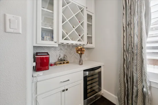 a kitchen with a sink and a window