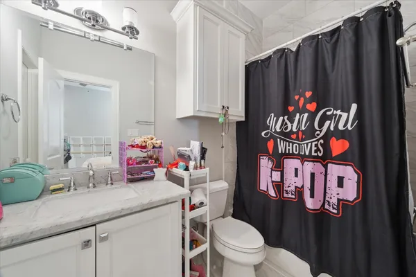 a bathroom with a sink and a toilet