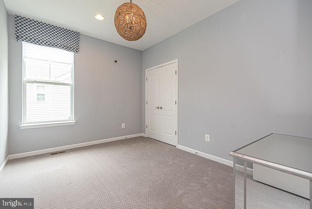 30134 Islander Beach Road Frankford, DE 19945 - Photo 36 of 73 an empty room with windows