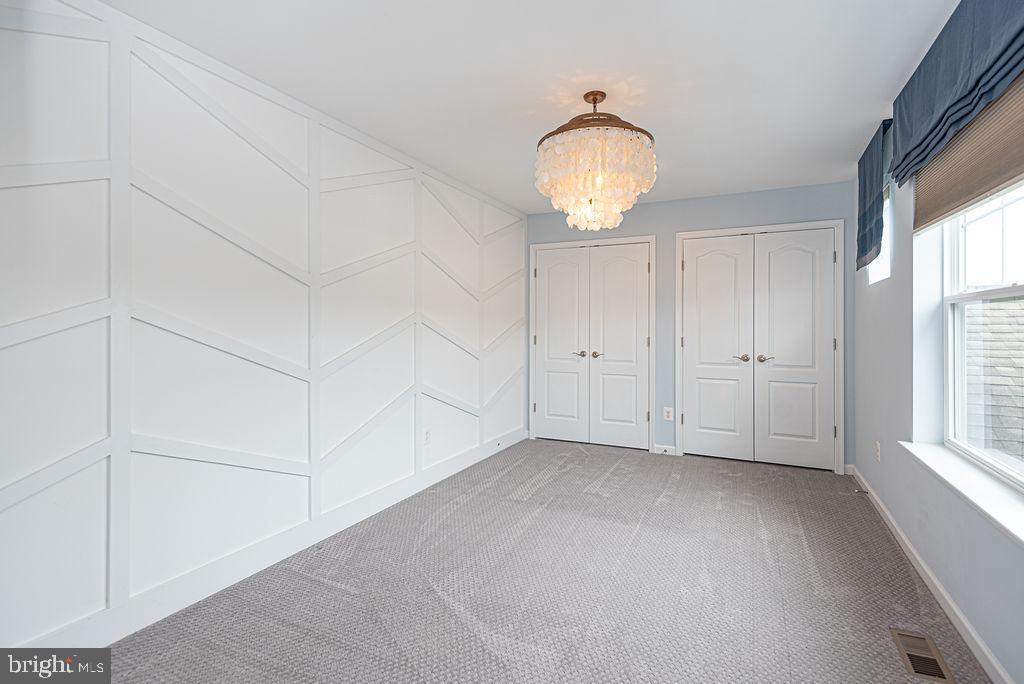 30134 Islander Beach Road Frankford, DE 19945 - Photo 49 of 73 an empty room with windows