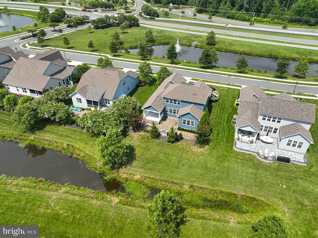 30134 Islander Beach Road Frankford, DE 19945 - Photo 71 of 73 an aerial view of a house with a yard basket ball court and outdoor seating