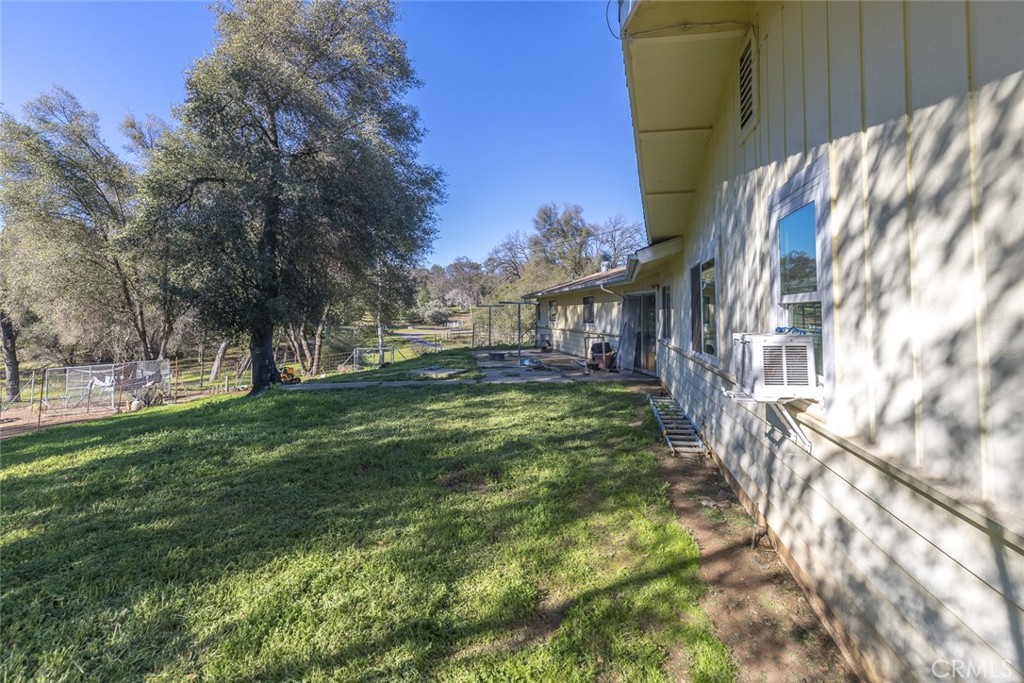 3977 Spring Court Mariposa, CA 95338 - Photo 33 of 72 a view of yard with swimming pool and trees