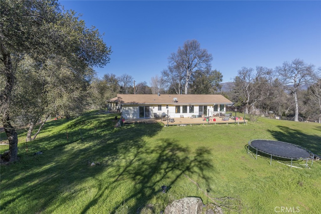 3977 Spring Court Mariposa, CA 95338 - Photo 56 of 72 a view of a house with garden and a yard