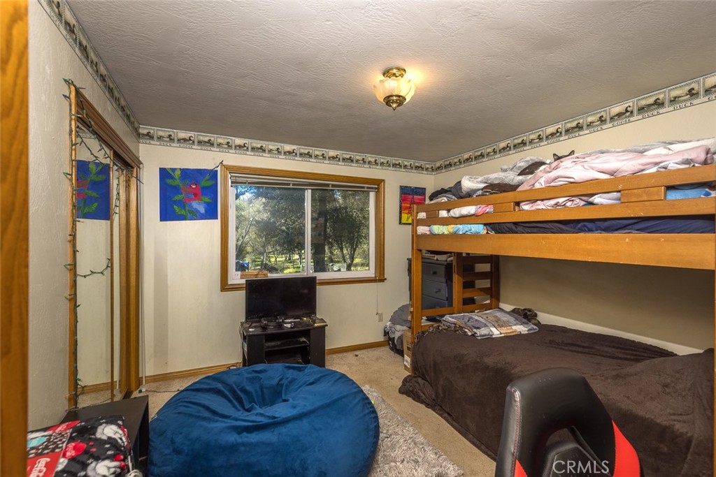 3977 Spring Court Mariposa, CA 95338 - Photo 65 of 72 a living room with furniture and a large window