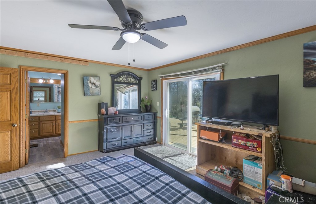 3977 Spring Court Mariposa, CA 95338 - Photo 69 of 72 a living room with furniture and a flat screen tv