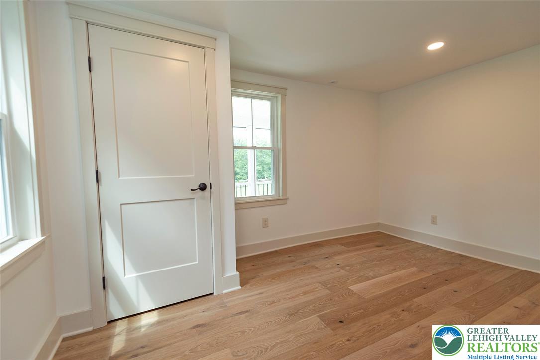 72 Allegheny Road Mount Bethel, PA 18343 - Photo 23 of 72 Hardwood floors and natural light illuminate this peaceful, ready-to-personalize room.
