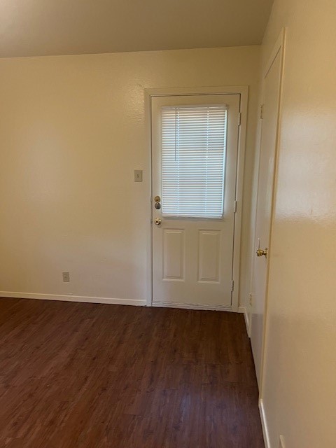 501 Hedgewood Drive, Unit C Georgetown, TX 78628 - Photo 13 of 17 an empty room with wooden floor and closet