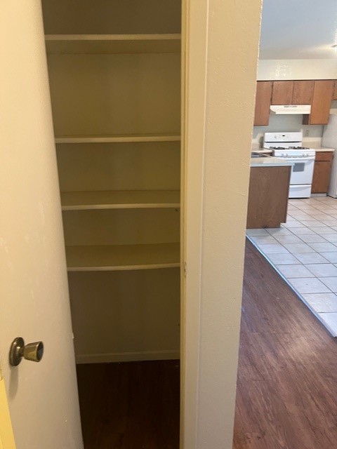 501 Hedgewood Drive, Unit C Georgetown, TX 78628 - Photo 17 of 17 a view of a room with wooden floor and a sink