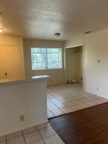 a view of kitchen with wooden floor