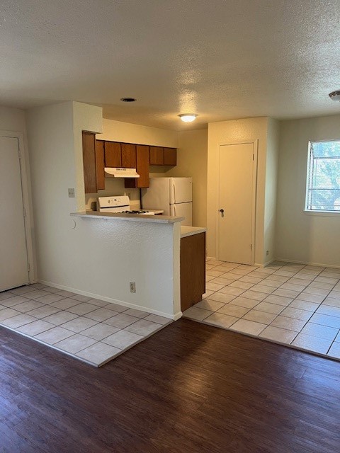 501 Hedgewood Drive, Unit C Georgetown, TX 78628 - Photo 4 of 17 a view of kitchen with wooden floor