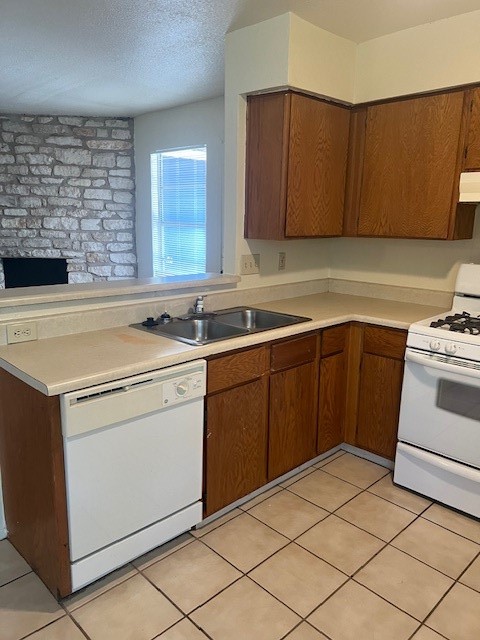 501 Hedgewood Drive, Unit C Georgetown, TX 78628 - Photo 6 of 17 a utility room with sink dryer and washer