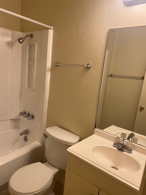 501 Hedgewood Drive, Unit C Georgetown, TX 78628 - Photo 9 of 17 a bathroom with a sink a toilet and shower