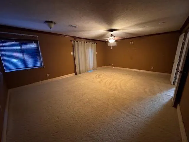 a view of empty room with windows