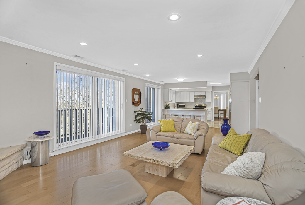 1125 Lake Cook Road, Unit 511 Northbrook, IL 60062 - Photo 12 of 18 a living room with furniture and a wooden floor