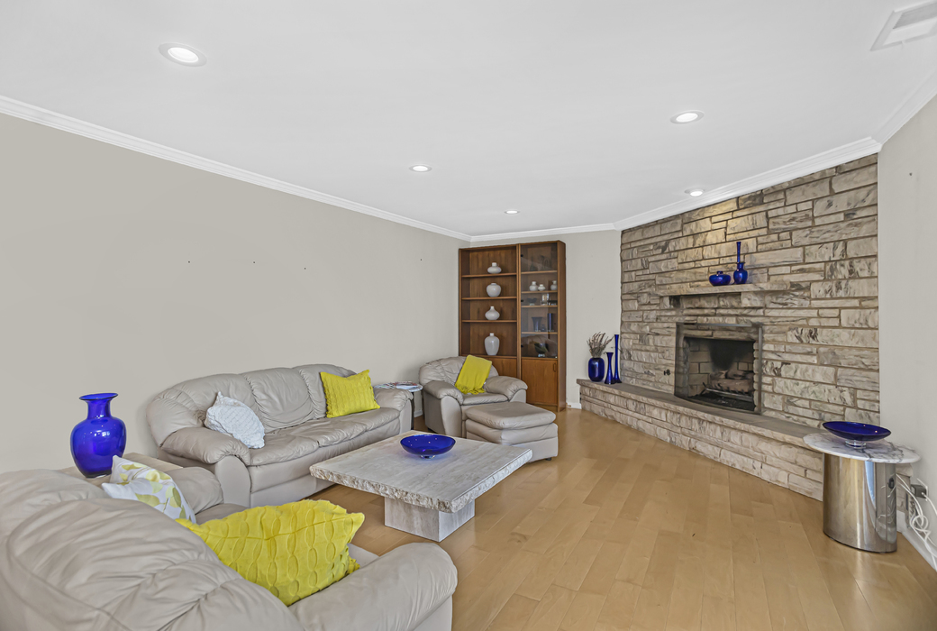 1125 Lake Cook Road, Unit 511 Northbrook, IL 60062 - Photo 9 of 18 a living room with furniture and a fireplace
