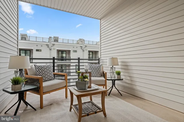 a view of a terrace with furniture