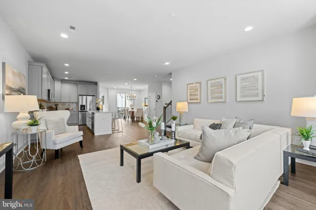 a living room with furniture and a table