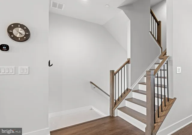 a view of entryway with wooden floor