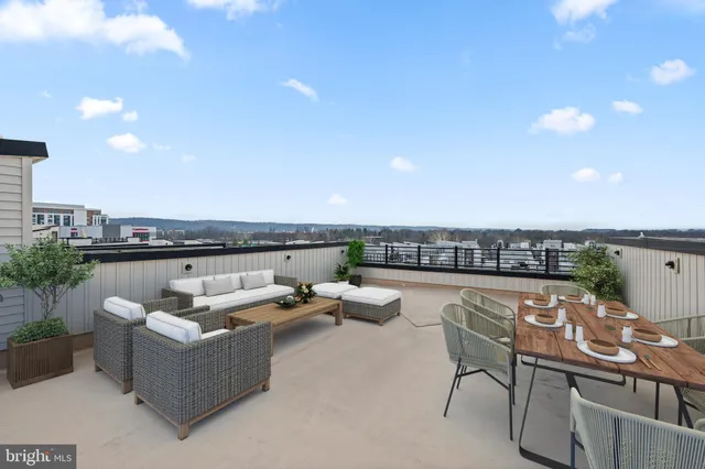 a view of a terrace with furniture