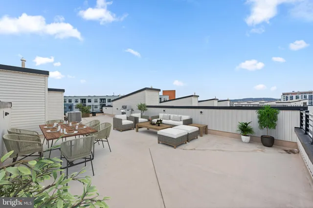 a view of a terrace with furniture