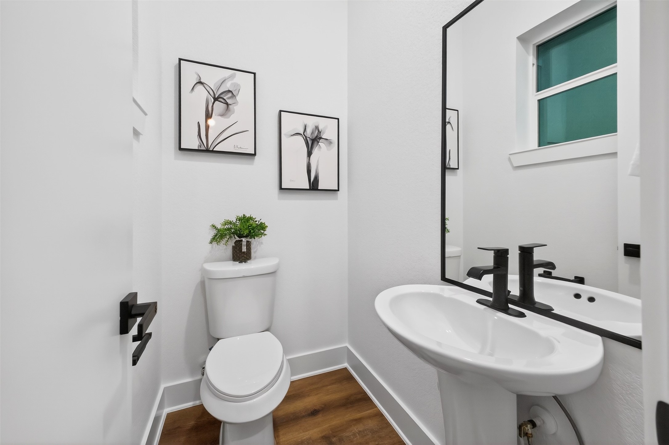 3003 A Delano Street Houston, TX 77004 - Photo 33 of 49 a bathroom with a sink toilet and a mirror