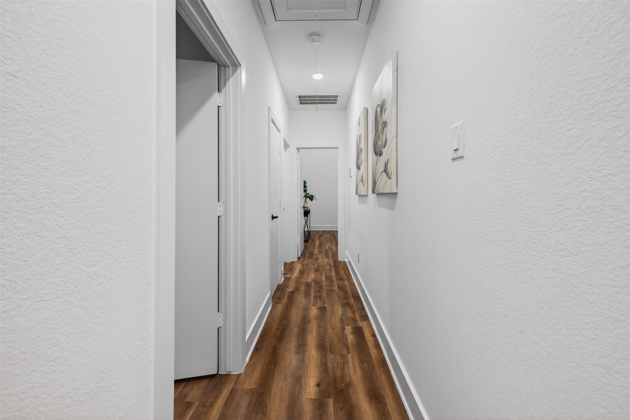3003 A Delano Street Houston, TX 77004 - Photo 36 of 49 a view of a hallway with wooden floor and staircase