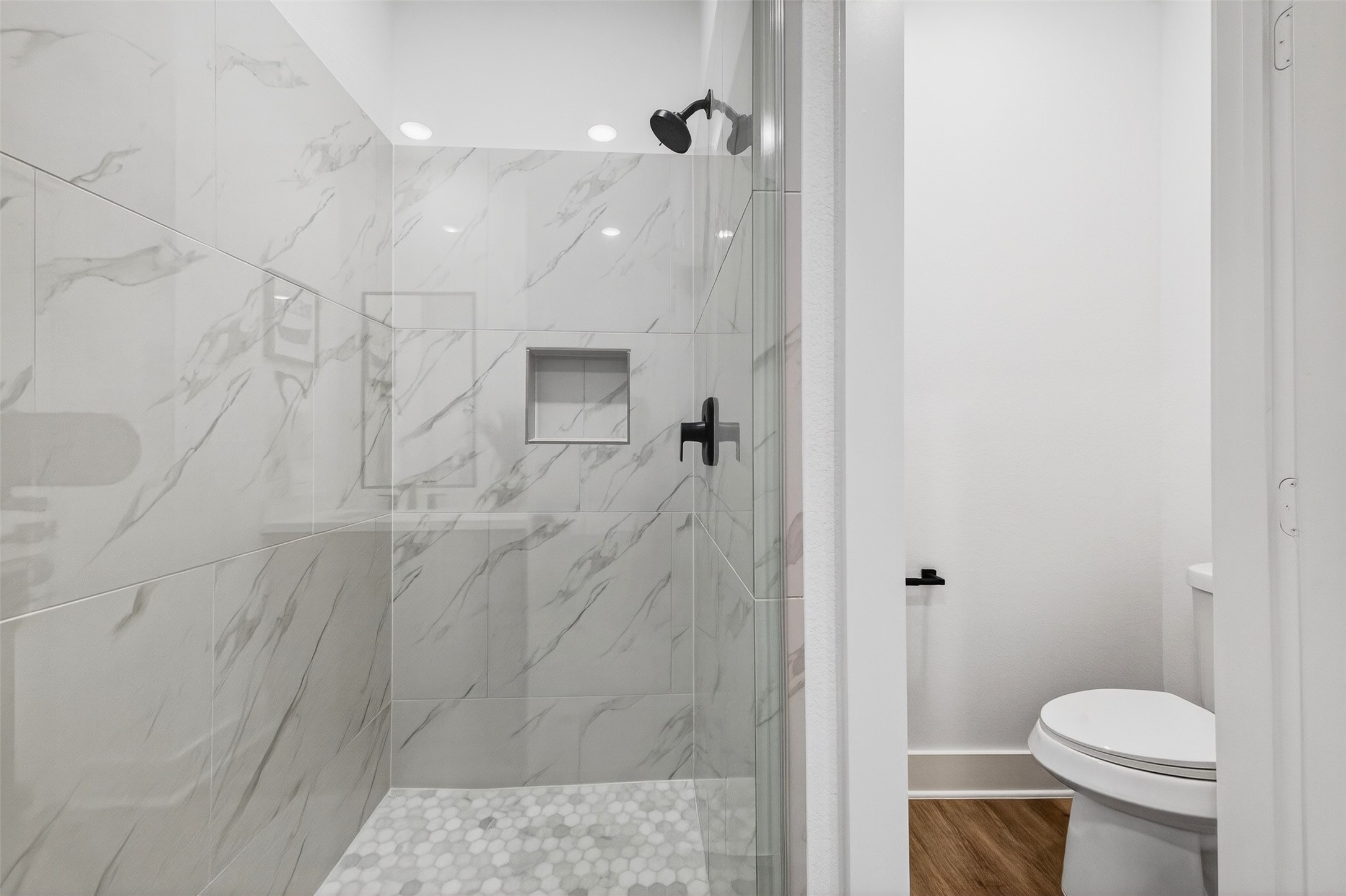 3003 A Delano Street Houston, TX 77004 - Photo 47 of 49 a bathroom with a toilet and shower