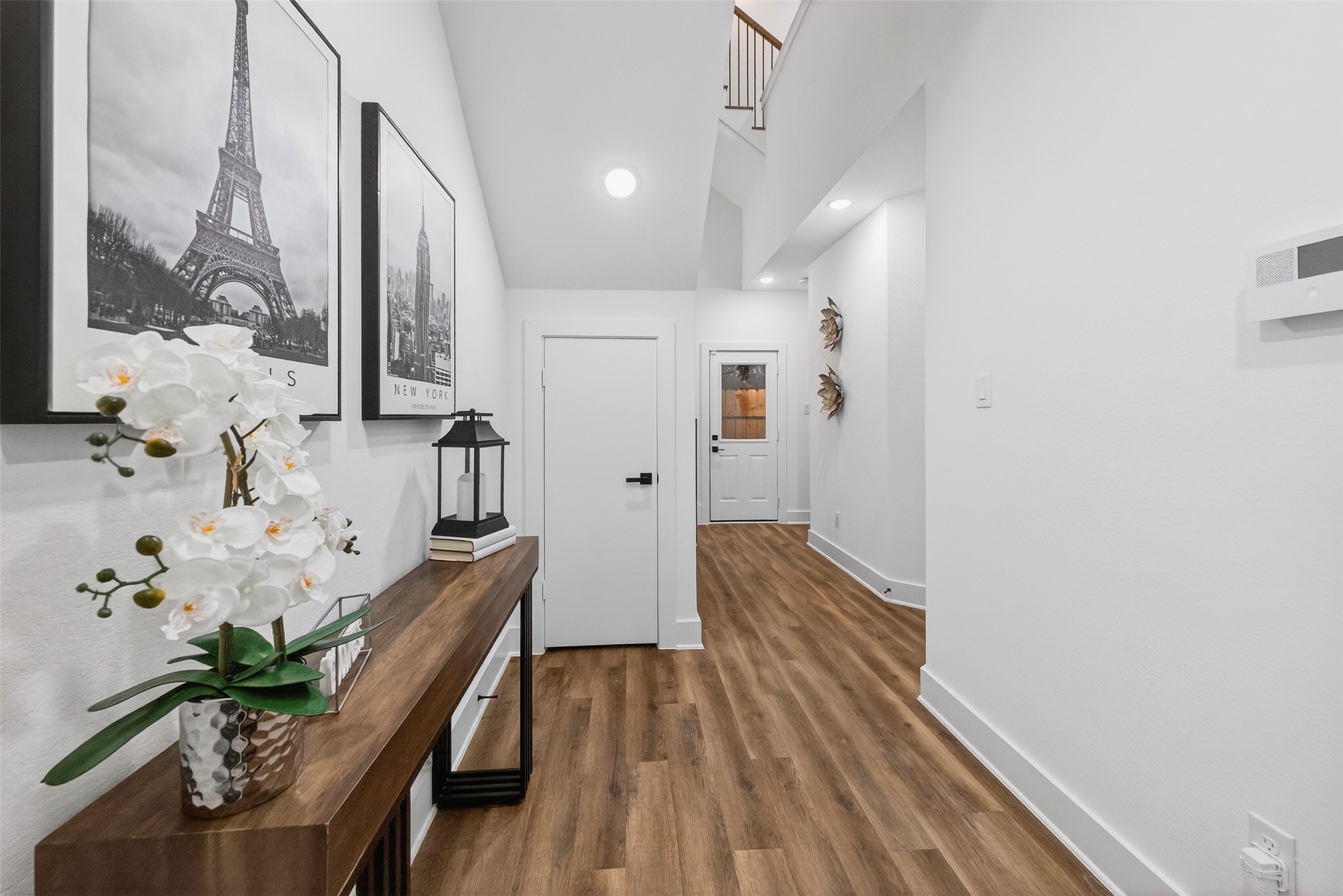 3003 A Delano Street Houston, TX 77004 - Photo 7 of 49 a view of a hallway with wooden floor and furniture
