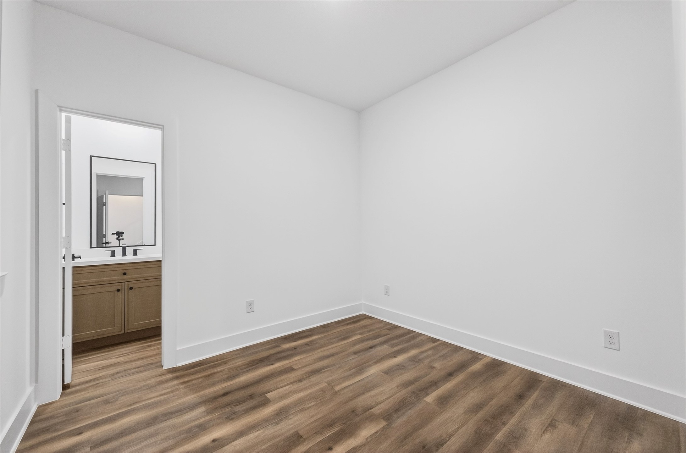 3003 A Delano Street Houston, TX 77004 - Photo 8 of 49 a view of empty room with wooden floor