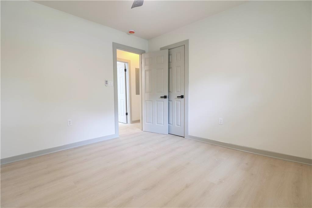 4396 Greenleaf Circle Southwest Atlanta, GA 30331 - Photo 11 of 18 an empty room with windows and closet