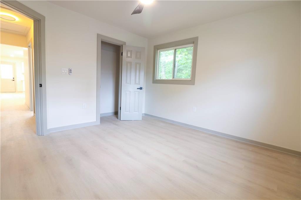4396 Greenleaf Circle Southwest Atlanta, GA 30331 - Photo 13 of 18 an empty room with windows and closet