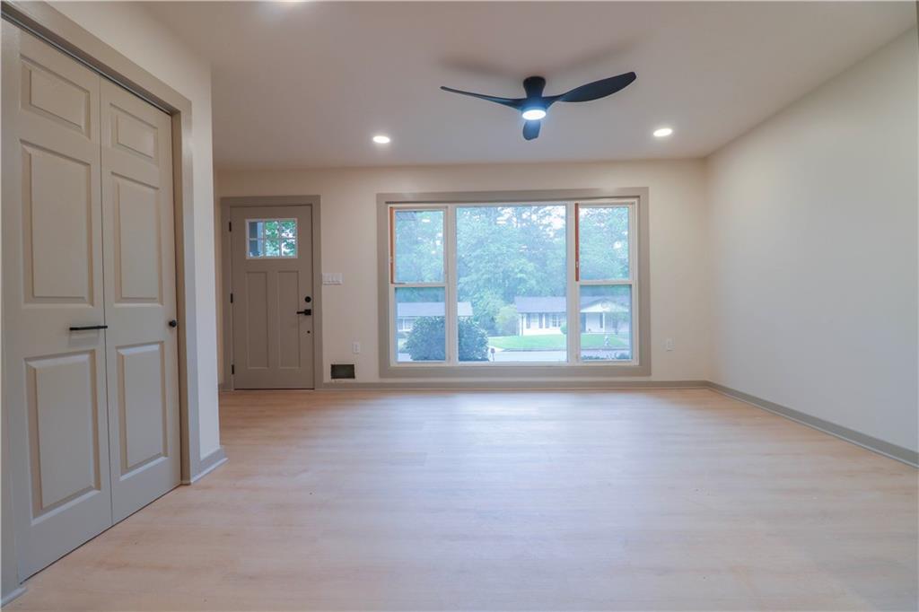 4396 Greenleaf Circle Southwest Atlanta, GA 30331 - Photo 2 of 18 an empty room with windows and outdoor view