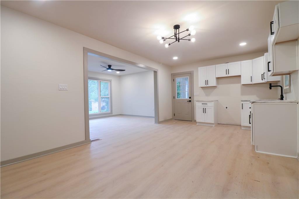 4396 Greenleaf Circle Southwest Atlanta, GA 30331 - Photo 6 of 18 a view of a kitchen with a sink and cabinets